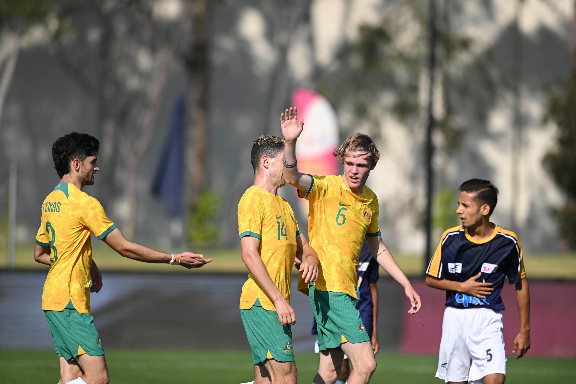Christian Bitsikas (L) and Joshua Beekes (R) hi-five during CommBank Pararoos v India at the IFCPF Asia Oceania Championships